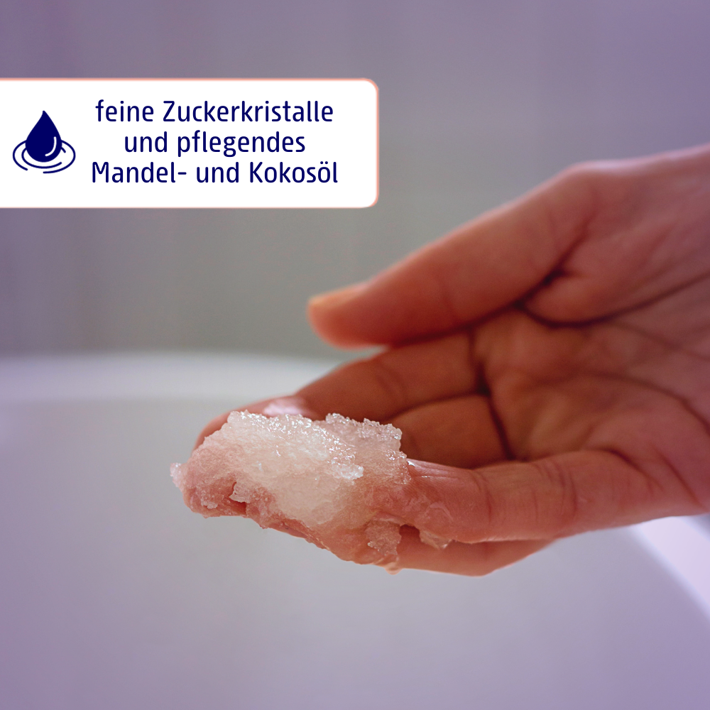 Zucker-Oel-Peeling ist mit feinen Zuckerkristallen und pflegendem Mandel- und Kokosoel